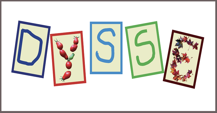 På fem lappar står bokstäverna D-Y-S-S-E. Två av dem, Y och E är formade av frukt och löv respektive.